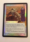 Pop out of the mysterious figure in the original art on this beautiful foil promo