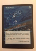 Based on the MTGO Cube/ Vintage Champs artwork, with border extension on Masques Brainstorm.  2/4 of a playset